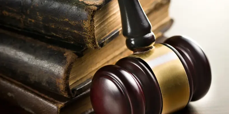 judge-gavel-with-old-books-2025-03-16-06-58-26-utc.webp